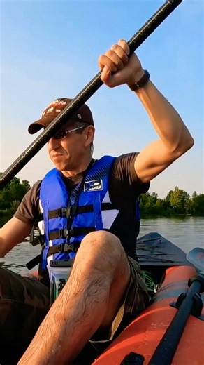 Inflatable Kayak (GoPlus) Paddling In Lily Pads.
