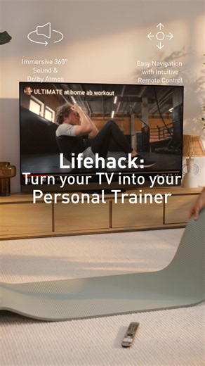Top Tip: If the cold and wet weather is putting you off visiting the gym, use your Panasonic Premium Z95B OLED TV as your own personal trainer. 🏋️​ The intuitive remote control and built in Alexa will have your favourite workout video playing in seconds, giving you more time to focus on your fitness goals going into 2026. 💪​ ------------------------------------------------​ [VIDEO DESCRIPTION] Video opens on a living room scene with a television remote on the floor, showing a workout video on 