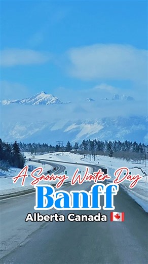 IJ Annie - YYC | Calgary | Travel & Lifestyle on Instagram: "☃️🎄🚗 A snowy winter day in Banff, Alberta Canada 🇨🇦 … and it truly feels magical. Snow-covered mountains, sparkling lakes, and a town wrapped in Christmas lights — it’s like stepping into a winter storybook. ✨ And yes… the turquoise lakes still shine through the snow. 💙 Banff in winter is something you have to experience at least once. #CalgaryToBanff #CanadianRockies #WinterRoadTrip #ExploreAlberta #TravelCanada #driving #mountai