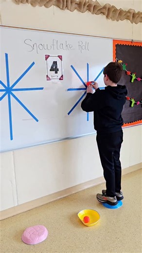 Snowflake Roll with balance! . This is an awesome balance activity, upper extremity, strength activity, and visual motor activity. . It's a super versatile activity that can easily be changed up by adding a balanced disc balance board or couch cushion. . Make different shapes on the board with painters tape! . Grate it down a level and remove any balance challenge. | Physical Activity & Motor Development for Kids by Pink Oatmeal