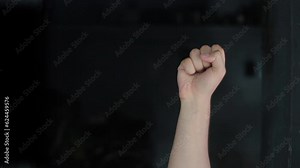 S s alphabet American sign language video demonstration in HD, American Sign Language (ASL) single-handed S s letter sign isolated on black background.