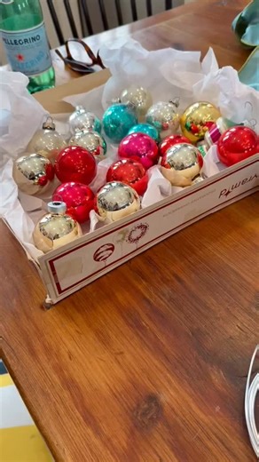 Rachel Herr on Instagram: "Wreath making. Part 1 of 4. Supplies: 18” Wreath Form 33’ tinsel Garland 75-100 ornaments(depending on size) Floral pins Wire You could also do this with a smaller wreath form Wire cutters #christmas #christmaswreath #christmascrafts #christmasdiy"