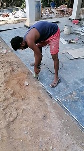 🔨✨ Routing the edges of our pavement tiles for a clean, smooth finish. Perfectly shaped edges make all the difference in tiling work! 😍👷‍♂️ #TilingWork #PavementTiling #TileEdging #SmoothFinish #ConstructionLife #ProfessionalTiling #DIYHomeProjects #HomeImprovement #TilingExperts #Craftsmanship #TileWork #ConstructionTools #TileRouting #PiumalPathirana #EngPiumalPathirana | Eng. Piumal Pathirana