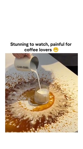 This viral video showcases a barista pouring espresso and steamed milk directly onto a flat white table to create intricate, mandala-like latte art patterns, blending spill techniques with precise pouring for a hypnotic 17-second display. Posted by @Tyler12407 , a frequent sharer of mesmerizing food visuals, it exploded to 4.1 million views within 24 hours, sparking 575 replies that split between awe at the innovation and frustration over apparent waste of premium ingredients. The clip taps into