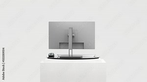 A slowly rotating pc desktop computer is displayed on the display stand. on a white background Use it for marketing and promotional gadgets. 3d rendering animation looping