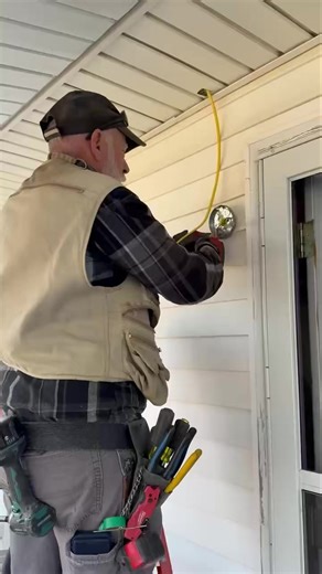 “Installing a new porch light fixture for a safer, brighter entryway.” #LegacyElectric #LicensedElectrician #ElectricalWork #CommercialElectrician #PoweringBusiness #TrustedProfessionals #SupportLocalBusiness | Legacy Electric