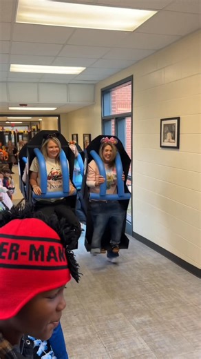 Hold on tight! It's Ms. Gibbs, Mrs. McCrary, Ms. Koch and Mrs. Morgan rockin’ and rollin’ through Halloween! #RockNRollerCoaster #DisneyVibes | New Georgia Elementary School