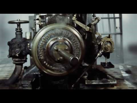 Watch This Massive Steam Engine Run a Working Factory