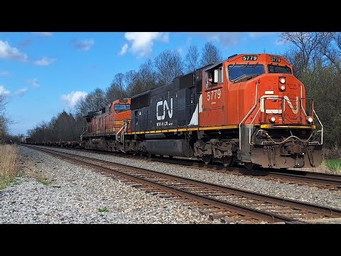 SD75I Leads A Freight Train!