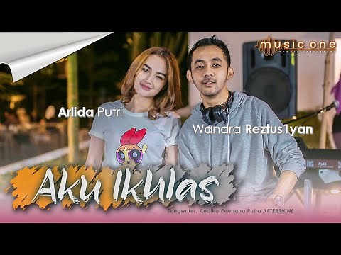 Arlida Putri feat Wandra - AKU IKHLAS (Official Music Video)