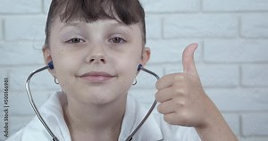 Fun hospital game. A pretty child play doctor game with a stethoscope in the room. Stock Video