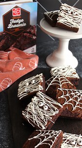 5.2K views · 90 reactions |  Get into the Halloween spirit with these spooky and delicious brownies! Follow along @TheSqueakyMixer as she whips up some chocolately treats using Harris Teeter's fudge brownie mix as the star ingredient, with white chocolate for icing. These treats are fun to decorate with your friends and yummy to eat! | Harris Teeter | Facebook