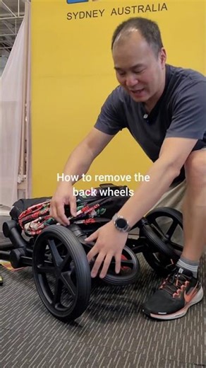 How to remove the back wheels on a stroller