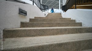 POV view a person walking up a set of stairs
