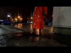 Shiny Red Raincoat Wearing It Out