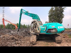 Kobelco Excavator With Blue Long Handle Scooping Soil, Working At Construction Site #461