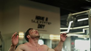 Man doing pull-ups in the gym - Free Stock Video