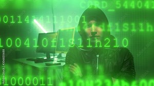 Hacker in dark room writing code or using computer virus program for cyber attack with running numbers video effect. 4K (UHD)