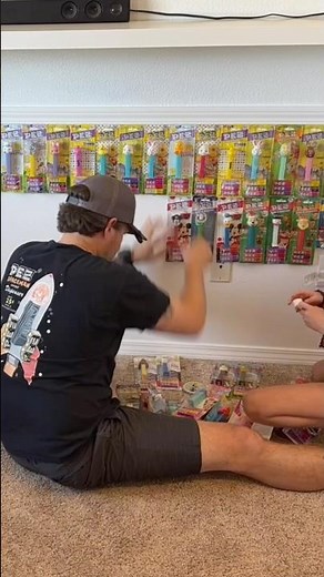 Putting up a Pez dispenser collection.