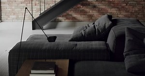 Modern contemporary Minimalist living room with bricks wall, large sliding windows and gray fabric furniture. Luxury Modern House Interior With Corner Sofa and Bookshelf. Fashionable furniture.