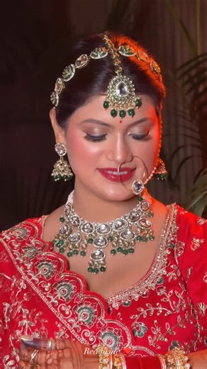 Neha Lalwani on Instagram: "Regal red bride with bold lips ❤️ . . Makeup @_gloss_and_glaze Hair @sanvihairstylist76 Outfit n jewellery @clothing_palette_by_goldy_ . . #makeupartist #makeupreels #makeup #reels #bridal #bridalmakeup"