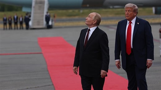 Expert 'reveals' chilling reason for Putin's hand gesture after Trump flies nuclear bombers over head