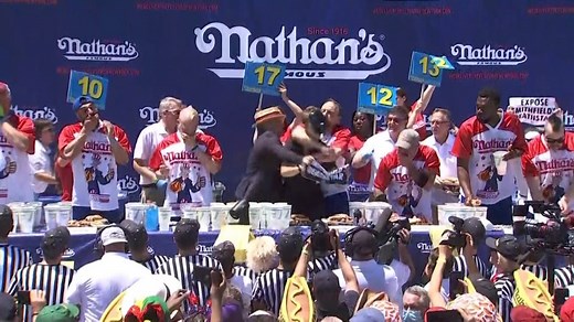 Joey Chestnut Unfazed by Protester, Still Wins Hot Dog Eating Contest
