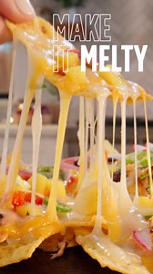 Create restaurant-quality nachos at home with Kraft Signature Mexican blend. | Kraft Natural Cheese