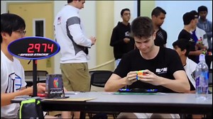 Rubik's Cube Challenge: Young Adults Compete to Solve