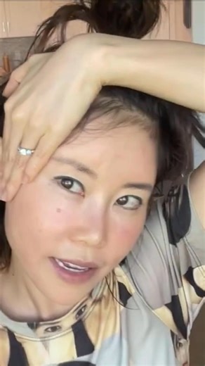 A simple 45° face yoga lift can change your look: tuck your chin in, lift up, and hold your gaze on the pinky. Just 10 seconds each side improves posture, defines your jaw, and supports a youthful, lifted face. Which side feels tighter for you? | Koko Face Yoga