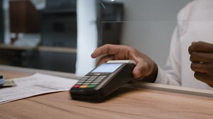 Payment Transaction at a Counter | Free Stock Video Footage