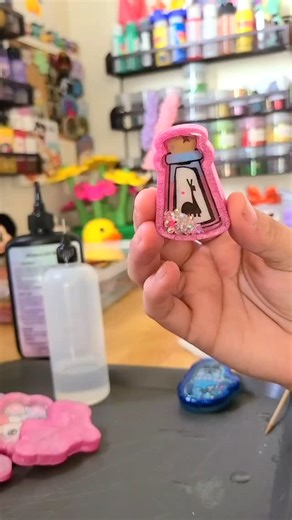 When you’re 99% evil genius and 1% ‘WRONG LEVER, KRONK’ 🧪✨Yzma’s llama potion walked so chaotic villains could run. 🦙 This friday at 5pm pst (Disneyland time) you can snag your very own Llama Potion charm as a phone grip, badge reel or keychain! #emperorsnewgroove #disneyvillains #disney #disneyobsessed #disneyaccessories | Resin Drops of Sunshine