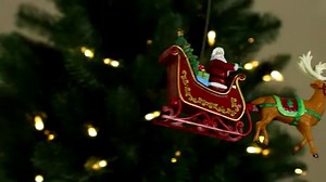 Watch Mr. Christmas Santa in Sleigh Animated Lit Tree Topper on Amazon Live