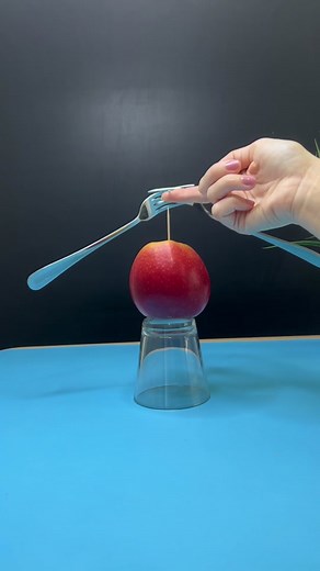 Balancing forks. Easy science experiment to make two forks balance on a toothpick. All you need is: - 2 forks - 2 toothpicks - Apple #scienceexperiments #stemactivities #scienceteacher #engineeringforkids #stemchallenge #learnontiktok