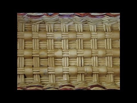 Weaving a rectangular bottom of a basket from newspapers