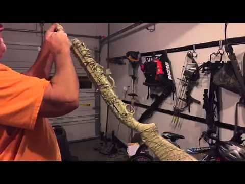 Painted my shotgun Camouflage with rubber bands. Duck hunting shadow grass Camo shotgun