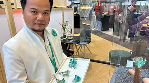 Jewelry designers at Geneva harness nature, swans, sweets and titanium