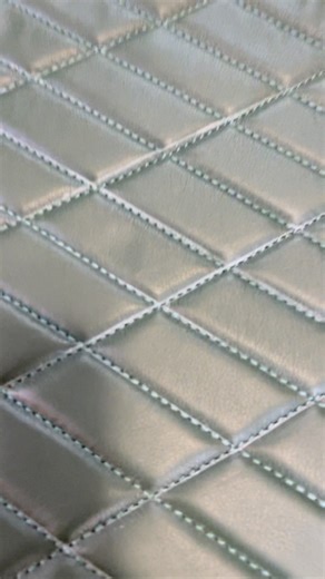 Quilting leather is honestly kind of boring. There, I said it. Running straight lines for hours? Not exactly thrilling. But poking the finished quilted leather and watching it bounce back? That part never gets old. This lambskin is soft like butter and quilting it creates this incredible plush texture that you just want to keep touching. Here’s something most people don’t realize: what goes inside a quilted leather piece actually matters. I use memory foam for my quilted bags because it gives yo