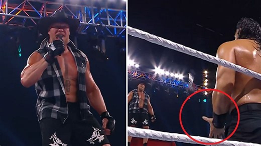 WATCH: Roman Reigns winks at Brock Lesnar after smooth mic catch; Twitter erupts