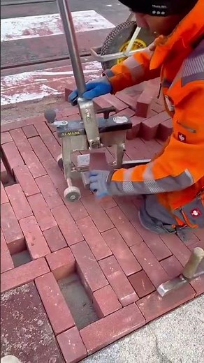 Cutting Paving Bricks with a Manual Block Splitter