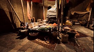 The old national African market bustles with life, featuring colorful stalls filled with spices, fresh produce, and handcrafted goods. The atmosphere is rich with culture and community interactions.