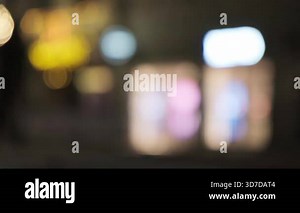 Colorful bokeh silhouette, multicolored bokeh lights forming abstract tree silhouettes with subtle motion and ambient glow