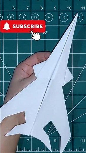 The paper fighter plane takes off in a matter of seconds.
