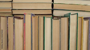 Lots of Books in library. Textbooks for education, learning, gaining knowledge at school, college or university