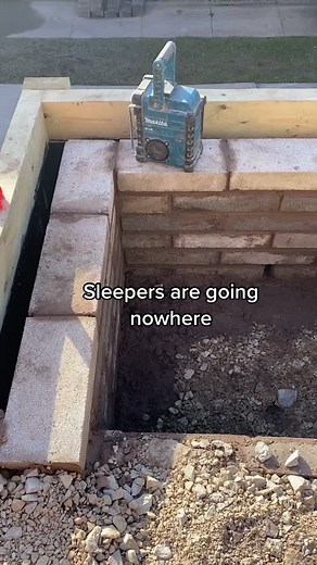 Block wall to keep the weight off the sleepers #foryoupage #fyp #landscaper #sleepers #blockwall #retainer