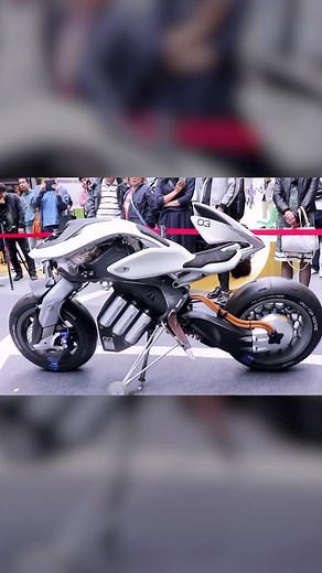 Digital Drift on Instagram: "Follow @digitaldrifttv to learn about how tech shapes the world! MOTOROiD is Yamaha’s vision of a motorcycle that interacts with its rider like a living creature. Unveiled at the 2017 Tokyo Motor Show, it features self-balancing AMCES technology, AI-driven image recognition, and a haptic human-machine interface, allowing it to stand up, move forward when called, and respond to gestures. Developed through close collaboration between designers and engineers at Yamaha’s