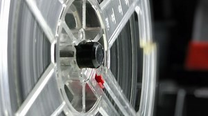 Projector playing a film, close up - Free Stock Video