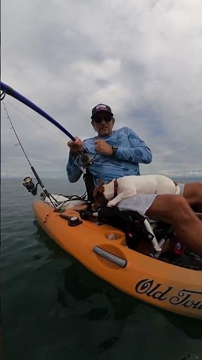 Nothing like sharing a big catch with your best bud! 😎💪🐾