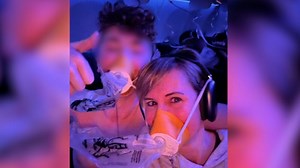 Teen who lost shirt due to hole in plane moved to sit with her. Hear what happened next | CNN