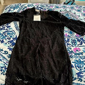 Black lacy dress I do not know the brand, but it is a size small and black.